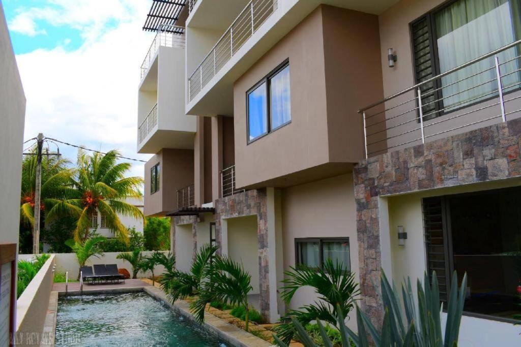 Modern And Cosy Condo: Westwood Apartments Flic en Flac Bagian luar foto
